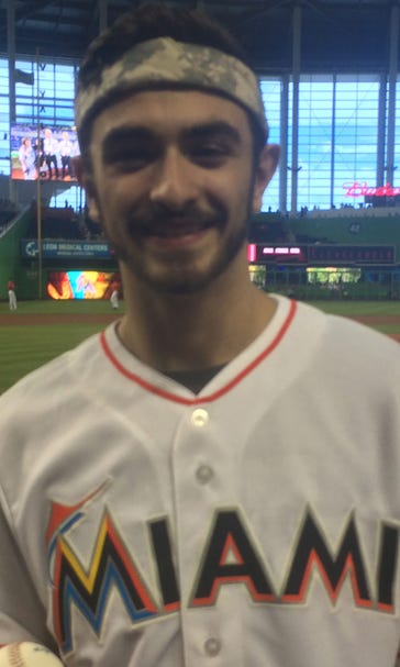 Winner of dance show comes full circle to throw out first pitch with Marlins